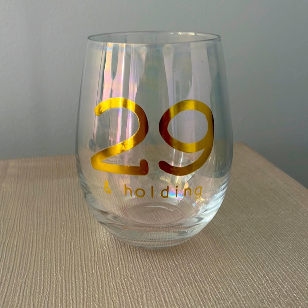 29 & holding wine glass